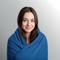 Składany w poduszkę koc podróżny Cozy