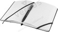 Zeszyt z białymi grzbietami stron i długopisem kulkowym