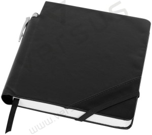 Zeszyt z białymi grzbietami stron i długopisem kulkowym